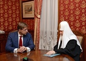 Відбулася зустріч Святішого Патріарха Кирила з мером Риги Н.В. Ушаковим