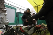 „Hangarul salvării” al Serviciului ortodox de asistență „Miloserdie” colectează haine de iarnă