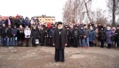 Participants in prayer vigil call to return the church in Khotyn Fortress to the community that has restored it from ruins