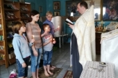 Беженцы из Донбасса приняли Таинство Крещения на Орловщине