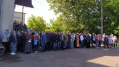 Faithful in Zhytomyr region stand in prayer protesting against illegal transfer of a Ukrainian Orthodox Church community to OCU