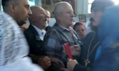Schismatics push priests and parishioners out of a Ukrainian Orthodox church in Kiev region