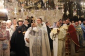 Russian and Greek clergymen celebrate at Gethsemane