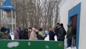 Deputies and public officials take part in the seizure of Intercession Church in the Ukrainian village of Chepelevka