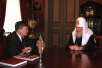 Встреча Святейшего Патриарха Алексия с делегацией Международной ассоциации фондов мира