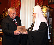 Святейший Патриарх Алексий встретился с директором Федеральной службы охраны РФ Е.А. Муровым