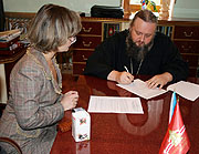 Госархив Кемеровской области и Кемеровская епархия подписали соглашение о сотрудничестве