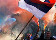 Участники акции протеста прорвались в посольство США в Белграде